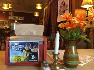 Cards on every napkin dispenser!